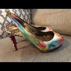 Christian Louboutin peep toe pumps
